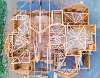 under construction house built with wooden blocks